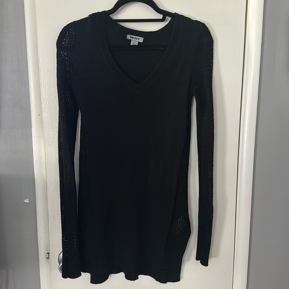 Black DKNY arm and shoulder mesh sweater.